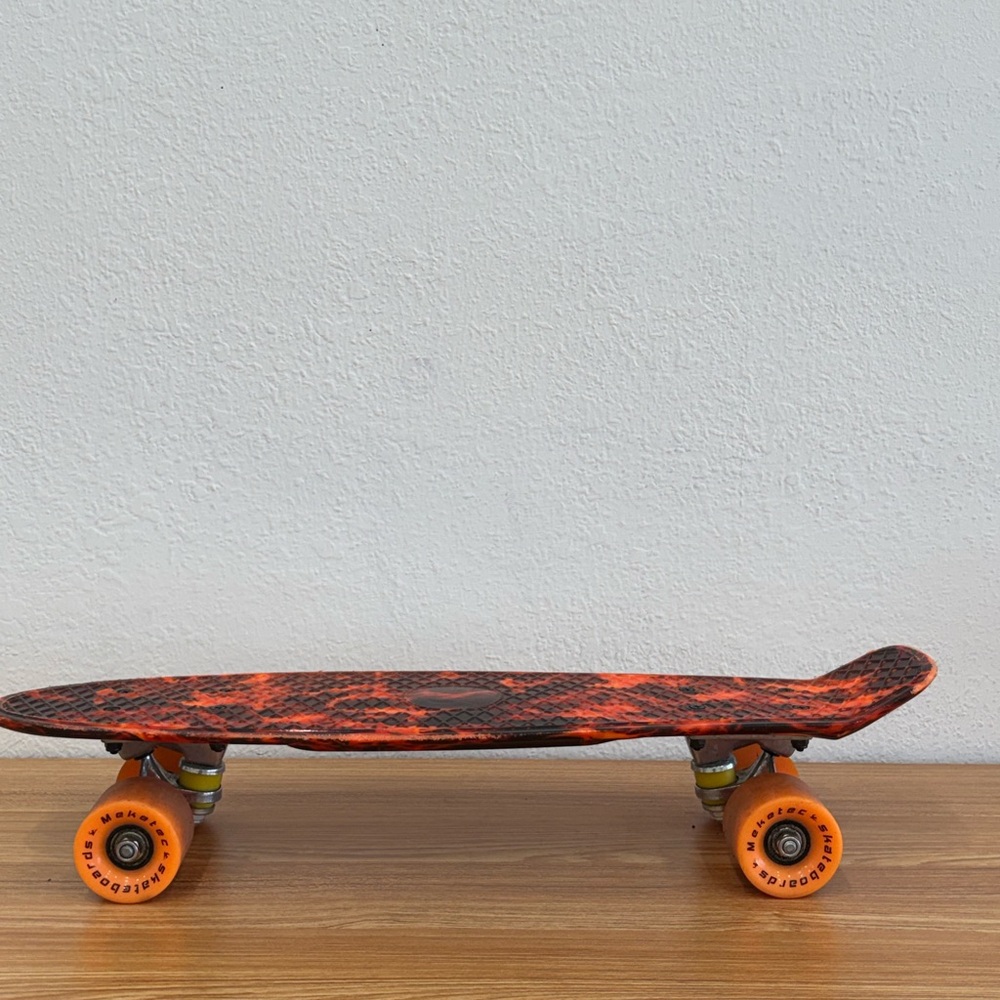 Orange and Black Mini Skateboard